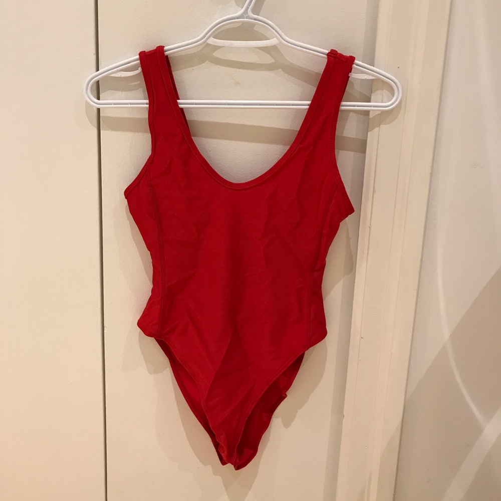 Red shiny disco bodysuit